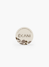 Ecani small travel all natural whipped tallow cream container with cow print design on a white background
